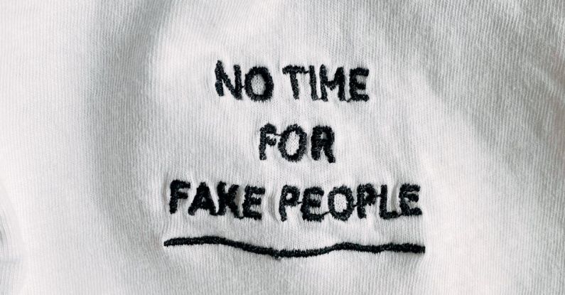 Objective Statement - White cotton cloth with inscription on black font